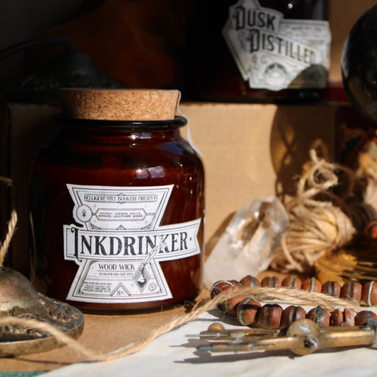 Inkdrinker 8oz Soy wax wood-wick candle in amber jar