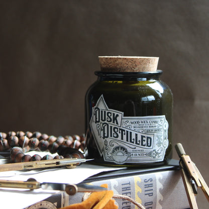 Dusk Distilled 8oz Soy wax wood-wick candle in green jar